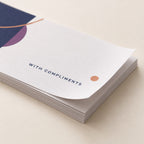 Close-up of compliment slip paper and print detail