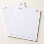 Printed A4 letterheads with original navy and apricot stationery design